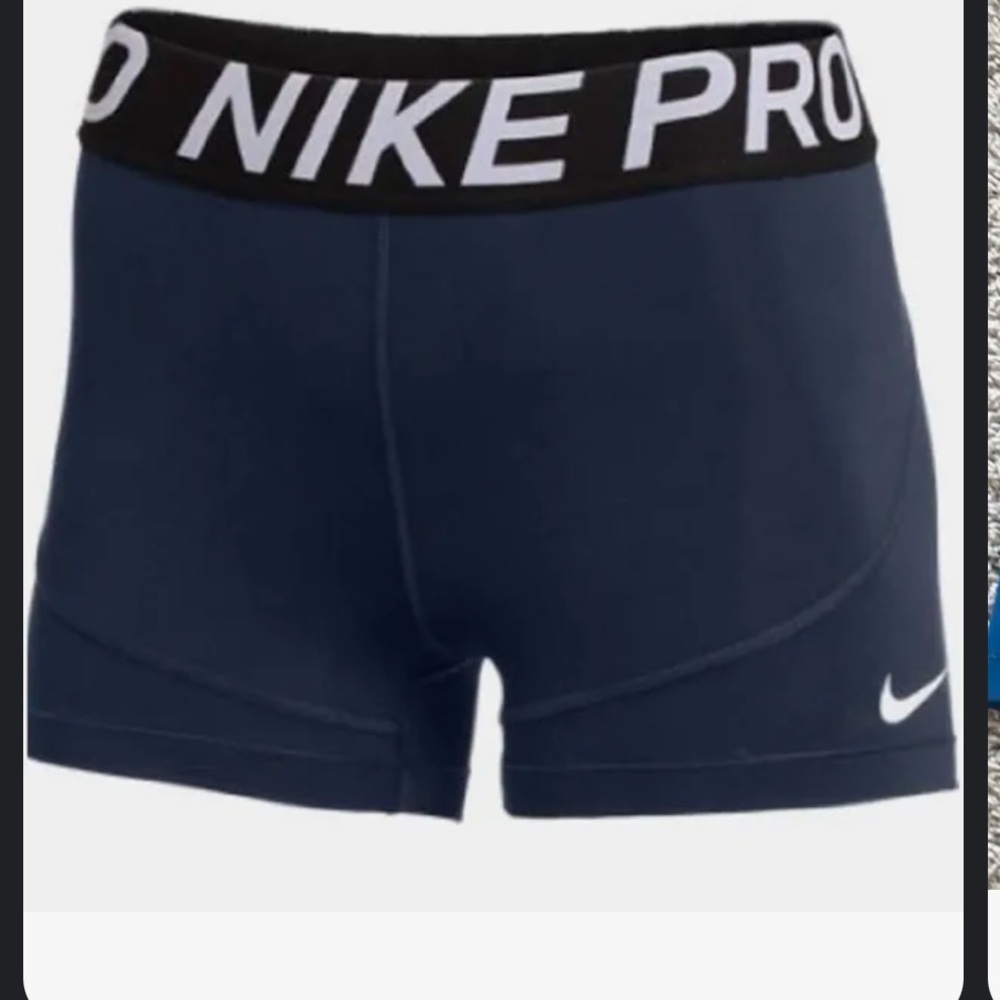 Navy blue Nike pros w black band